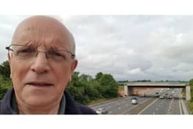 Cllr Richard Dickson with the A46 Bridge near Kenilworth in the background. Photo supplied.