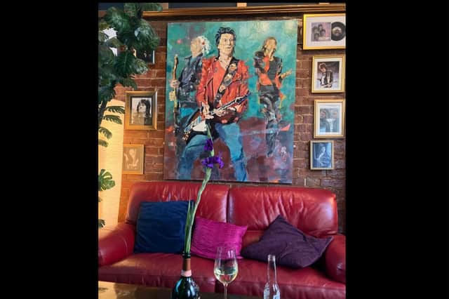 The Ronnie Wood abstract portrait in Ronnie's Bar in Warwick. Photo by Rupam Barthakur