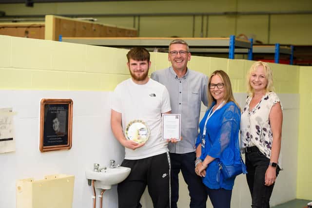 Jack Kettleborough is joined by Terry Barker, Jamie’s mum Naomi Rees-Issitt, and Natasha Barker in the college’s workshop which also features a plaque in honour of Jamie.
