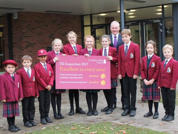 Headmaster Robert Duigan with pupils from Crackley Hall School