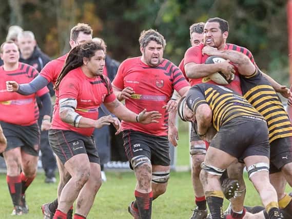 Newbold against Derby on Saturday, with KJ Henry, Nick Walton and Ben Nuttall in  action