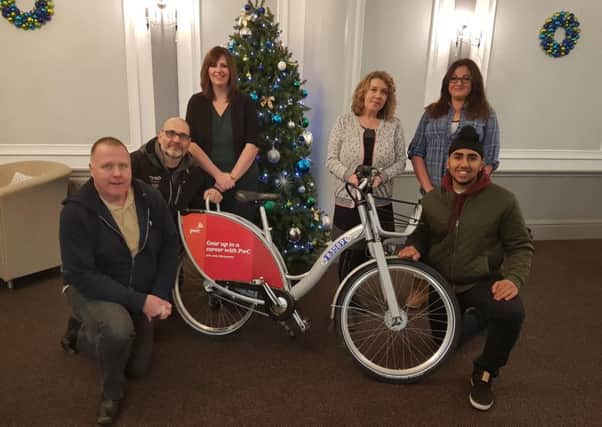 From back left: Caroline Beresford (trustee of Evelyn's Gift and manager at Warwick Arms), Helen Smith (founder and Chair of Evelyn's Gift), Gemma Barrow from Rugby First Responders. 
Kneeling from left is Paul Mallabone,  First Responder, Dean Tranter and nextbike ambassador and University Warwick student, representing Nextbike, Amandeep Singh Baryah.