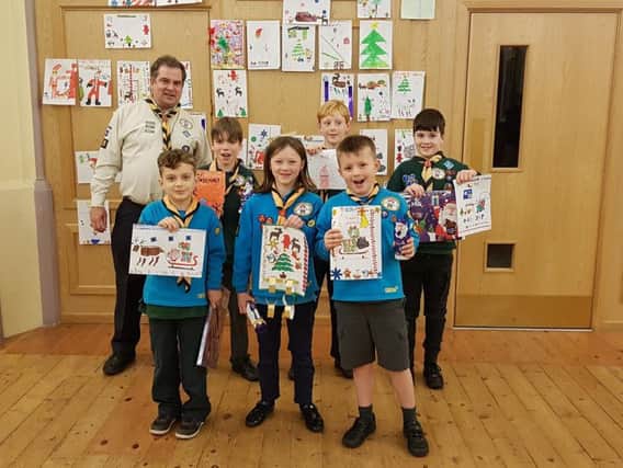 Group Leader Nick Schofield with Beavers and Cubs from 4th Kenilworth