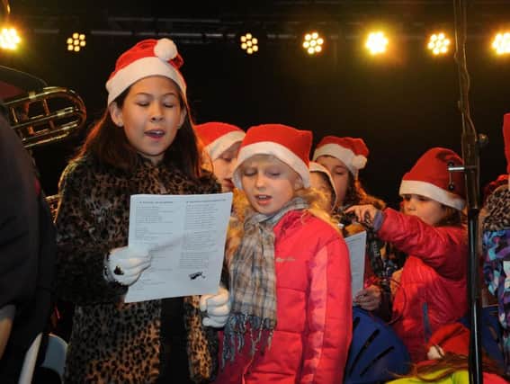 Children enjoying a previous Lions carol concert