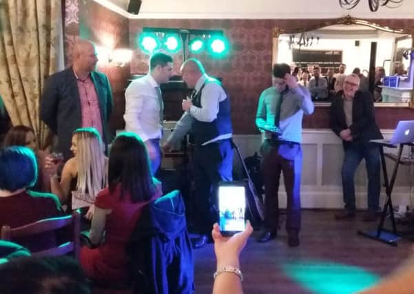 A stunned Fenton Collins with the Tom Kelleher Player of the Year award
