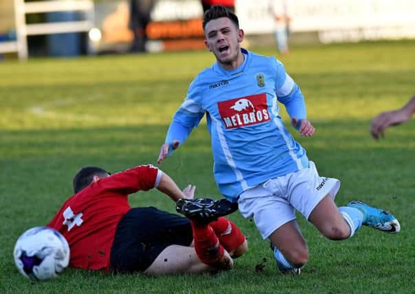 Stuart Hendrie hacked down in Saturday's win  PICTURES BY MARTIN PULLEY