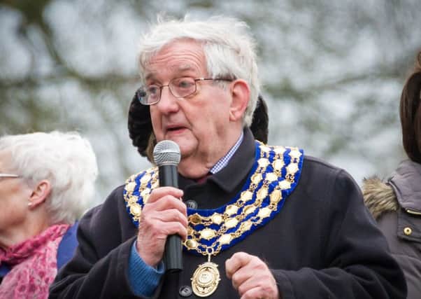 Cllr Michael Coker addressing a crowd at the annual Duck Race during his time as Kenilworth's mayor. NNL-151226-162617009