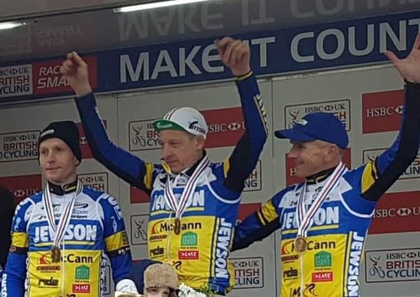 Rugby's Phil Roach (centre) won the national title for riders 55+ and MI Racing took the team title