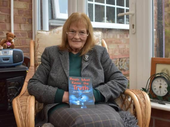 Jean Bradley with her new book.
