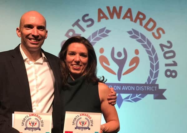 Do3 coach Dave Knight and Rugby triathlete Corinne Moss with their awards
