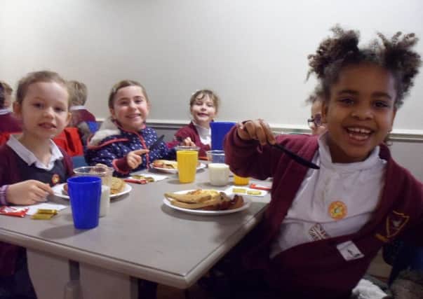 Ferncumbe School children enjoy their full Englush breakfast at Hatton Country World.
