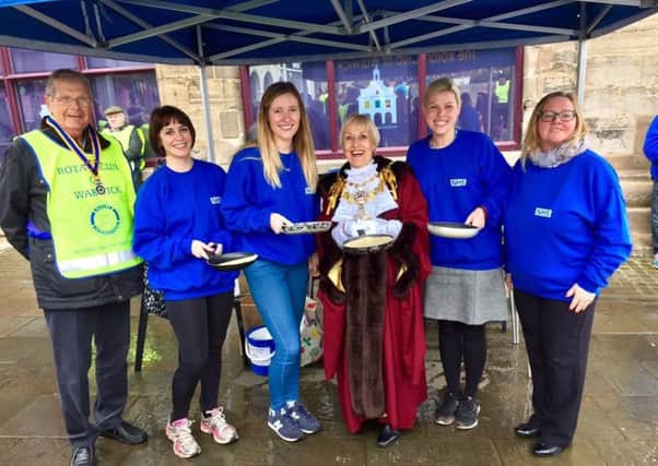 Photo of one of the teams with the then Mayor of Warwick Christine Cross at Pancake Day Races in 2017.