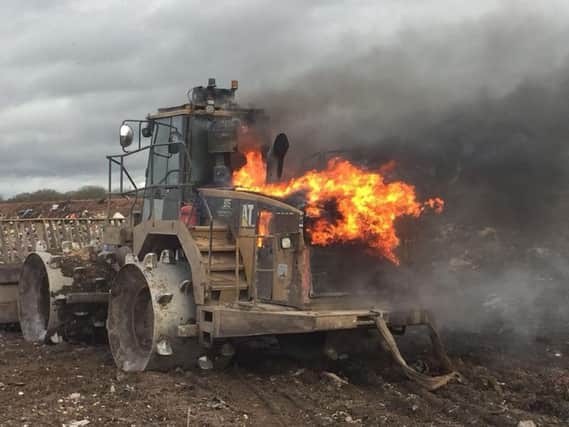 The digger on fire near Bubbenhall. Picture: Warwickshire Fire and Rescue Service