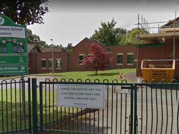 The entrance to St John's Primary School off Mortimer Road. Copyright: Google Street View