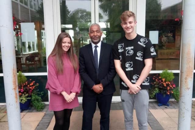 Kenilworth School's headmaster Hayden Abbott (centre) with Sixth Form students Lucy Taylor and James Wilding, who achieved three '9' grades in their GCSEs last year