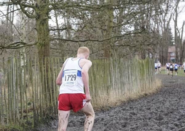 Phil Gould prepares to tackle one of the boggy sections at Wollaton Park. Pictures submitted