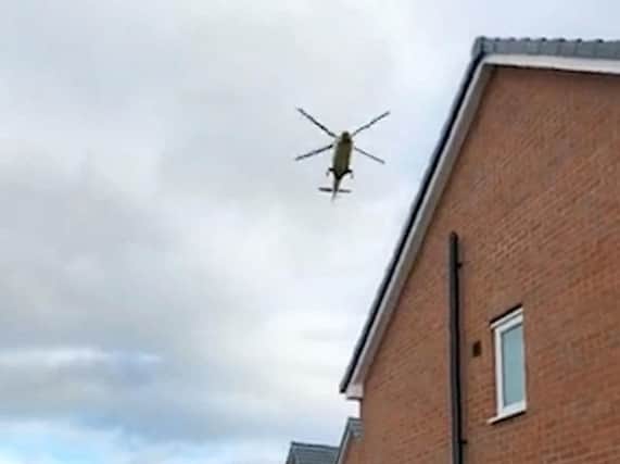 The air ambulance flying overhead