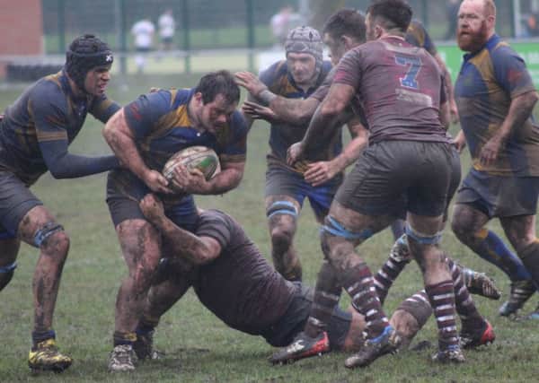 Silhillians and Kenilworth battle it out in a mudbath at Warwick Road. Picture: Willie Whitesmith