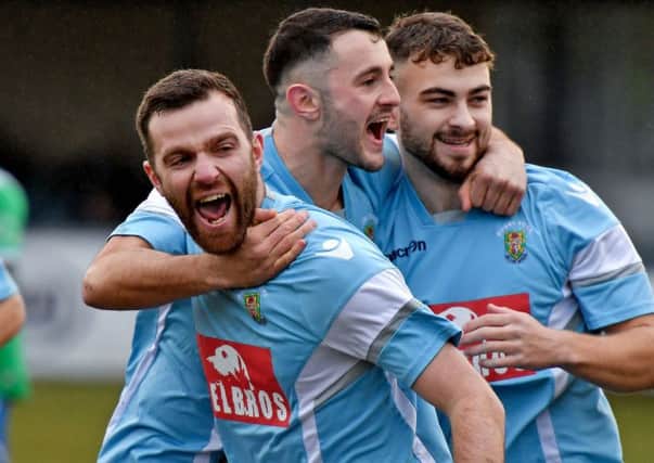 Sam Belcher celebrates putting Rugby Town ahead from the penalty spot    PICTURES BY MARTIN PULLEY