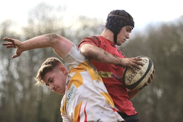 Joss Thompson - one of the three Thompson brothers in the Newbold team - winning a lineout