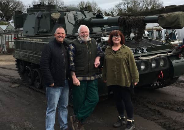 Steve Atherton with Mick Walter and Helen Willoughby Cooper during his drive a tank challenge.