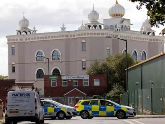 Police cars near the Gurdwara Sahib in Leamington when the incident happened