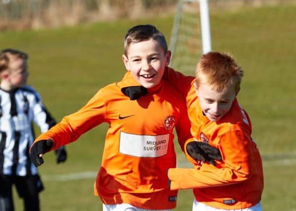 Celebrations for Rugby Town U9s Tigers against Athletic United