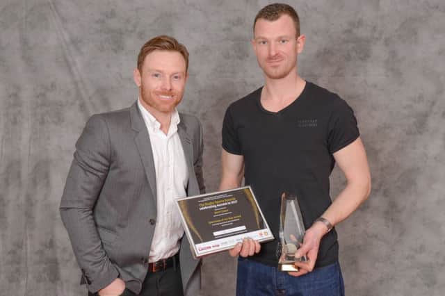 Mark Cossar receiving his Rugby Sportsman of the Year 2017 award from England cricketer Ian Bell last month   Picture by Jamie Gray