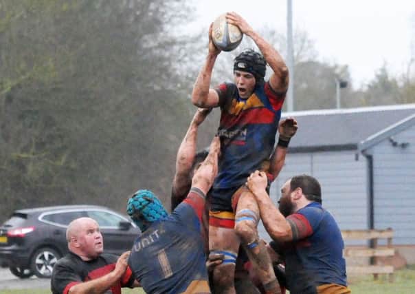 Tom Lane wins a second-half lineout for Leamington. Pictures: Morris Troughton