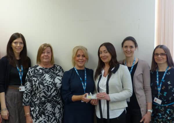 The syringe driver is presented to the specialist palliative care team
