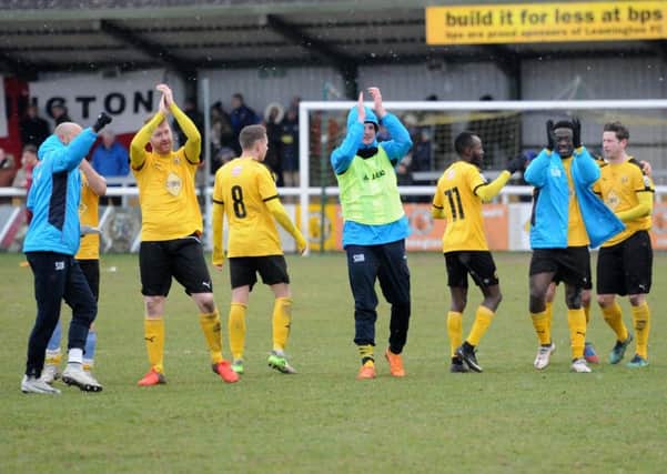 Brakes players show their appreciation to the fans at the final whistle.