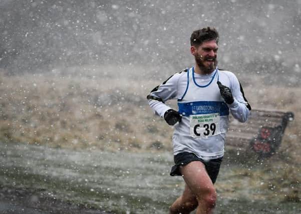 Jamie Langley battles the worst of the conditions at Sutton Park.
