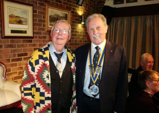 John Stirling with Royal Leamington Spa Rotary Club president Brian Bassett.