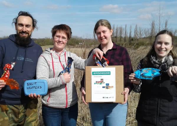 Warwickshire Wildlife Trust staff Pete Thorne, Louise Barrack, Philippa Truman and Debbie Wright with biscuit wrappers. Photos by Paula Irish (WWT) 2018.