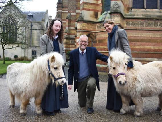 Iona Craig (left) with Anousha Salehi and Rugby School chaplain Richard Horner.