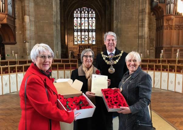 Left to right: poppy team members Carol Warren and Gill Benson, with Warwick Mayor  Stephen Cross and his wife, Cllr Christine Cross.