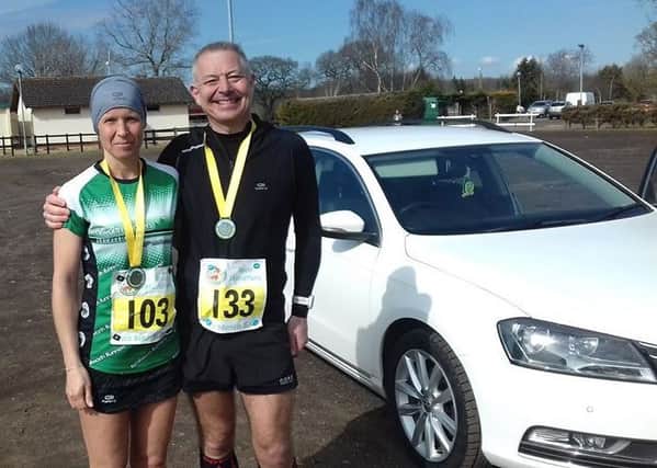Louise Andrews and Neil Sheward celebrate their Mad March Hare Half Marathon wins. Picture submitted