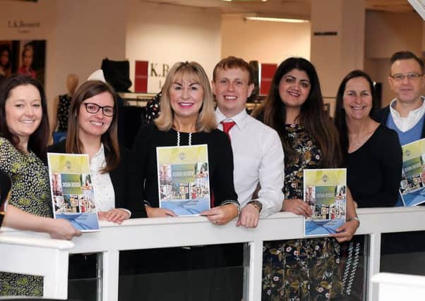 Pictured, left to right, are Stephanie Kerr (executive director, BID Leamington), Sarah Jones (manager, Royal Priors Shopping Centre), Sue Warburton (joint owner, Belvoir Sales and Lettings), Gary Newman (business relationship manager, Santander), Gurdip Chatha (owner, EsquÃ© Beauty), Alison Shaw (project manager, BID Leamington), and Matt Crooks (owner, Neals Yard Remedies) with the BID Leamington Business Plan at House of Fraser.
