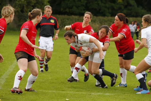 Rugby Lionesses (in red) playing against England Deaf team at RugbyFest in the autumn   (Picture by Tony Wilding)