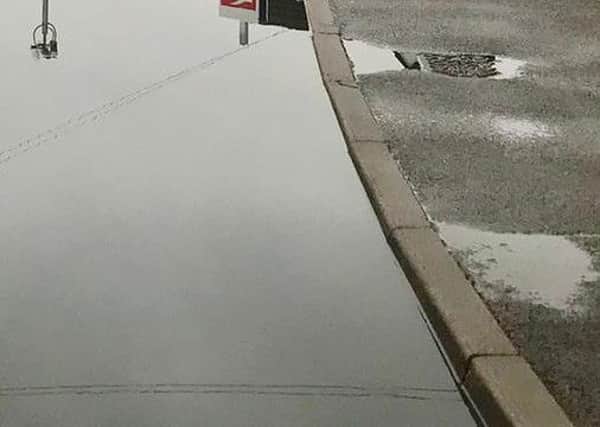 The puddle outside Kenilworth Station in Priory Road. Photo: Fraser Pithie