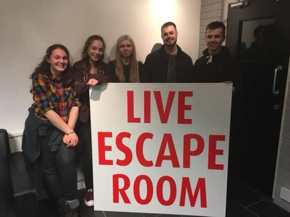 A team from the Huntsman Carvery after tackling to escape room.