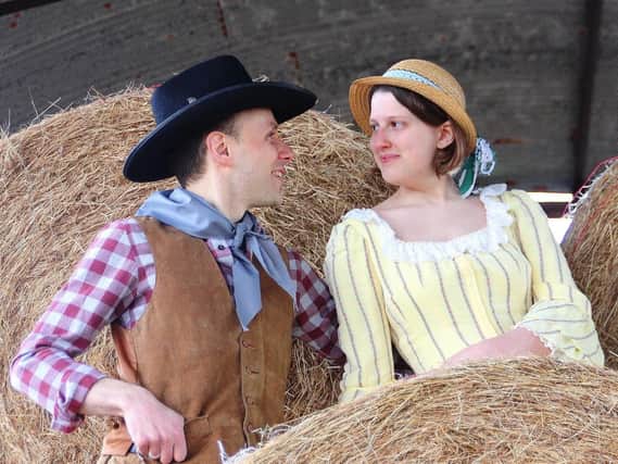 Will Parker, played by Andrew Thomas, and Ado  Annie, played by Erica Webber, in Oklahoma! at the Spa Centre in Leamington