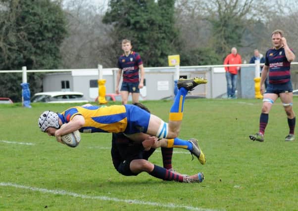 Will Johnson dives over for Kenilworth. Pictures: Morris Troughton