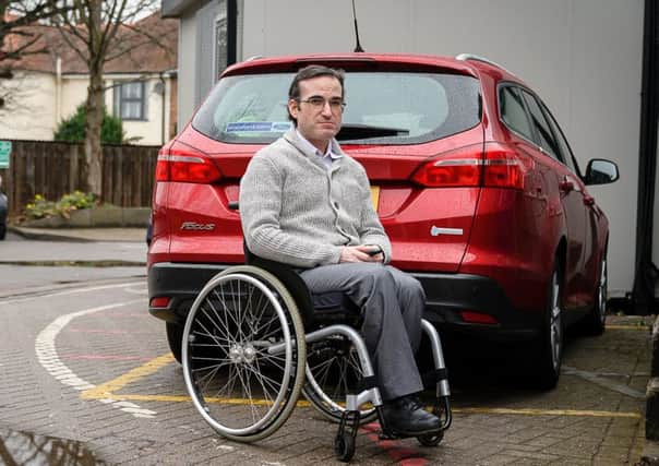 Simon LaBarbera has not had his disability benefit since December 2017. He missed an assessment in November when the benefit changed from Disability Living Allowance to Personal Independence Payment, and has not been reassessed since. Simon uses a wheelchair, and is worried he will lose his Motability car, which will cost him his livelihood. NNL-181004-183927009