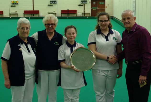 Ladies' Fours winners Mary Duckett, Maureen Edwards, Ailish Sheehan and Molly Fowler receiving their trophy from Thornfield competition secretary John Kilsby.