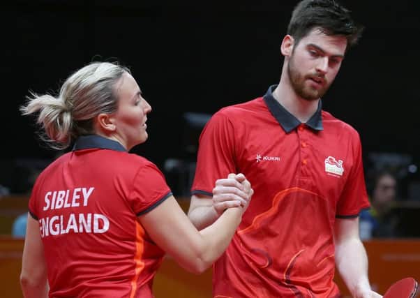 Kelly Sibley and doubles partner David McBeath. Picture: Jono Searle/Getty Images