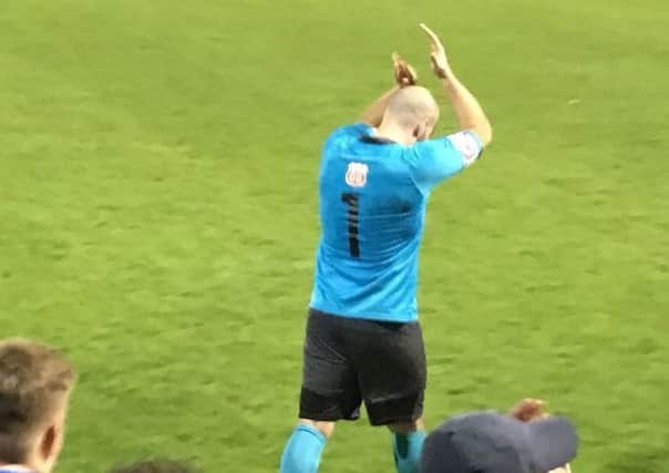 Tony Breeden acknowledges the home fans after the final whistle.