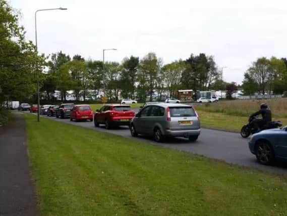 Traffic near Thickthorn Island at a previous horse fair