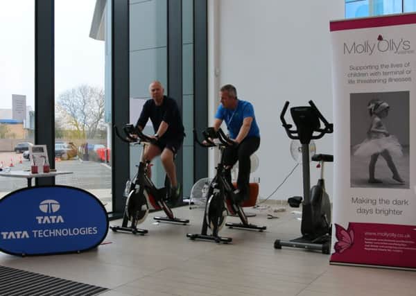 Members of staff at Tata Technologies took on a cycling challenge to raise money for Molly Olly's Wishes.