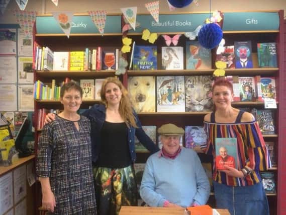 Henry Blofeld (centre right) with (from left) Jacinta McLaughlin, Tamsin Rosewell and Judy Brook of Kenilworth Books
